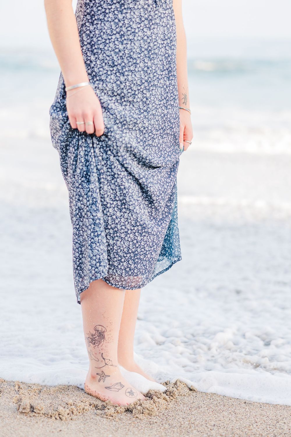 Royal High School graduate posing at Leo Carrillo State Beach in Los Angeles County for stunning outdoor graduation portraits.