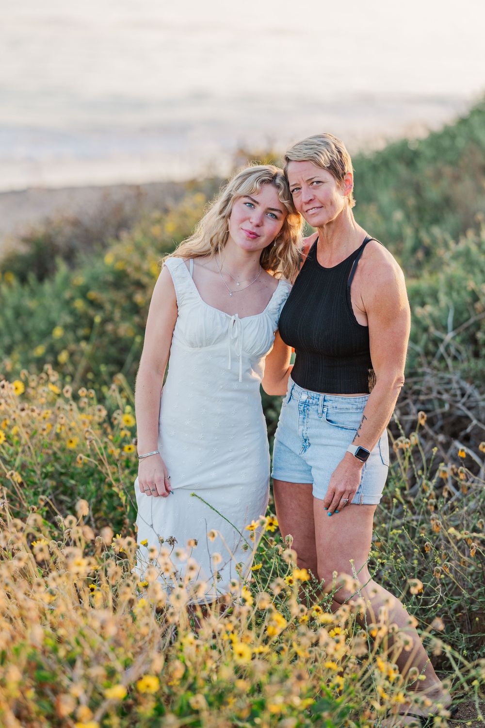 Royal High School graduate posing at Leo Carrillo State Beach in Los Angeles County for stunning outdoor graduation portraits.
