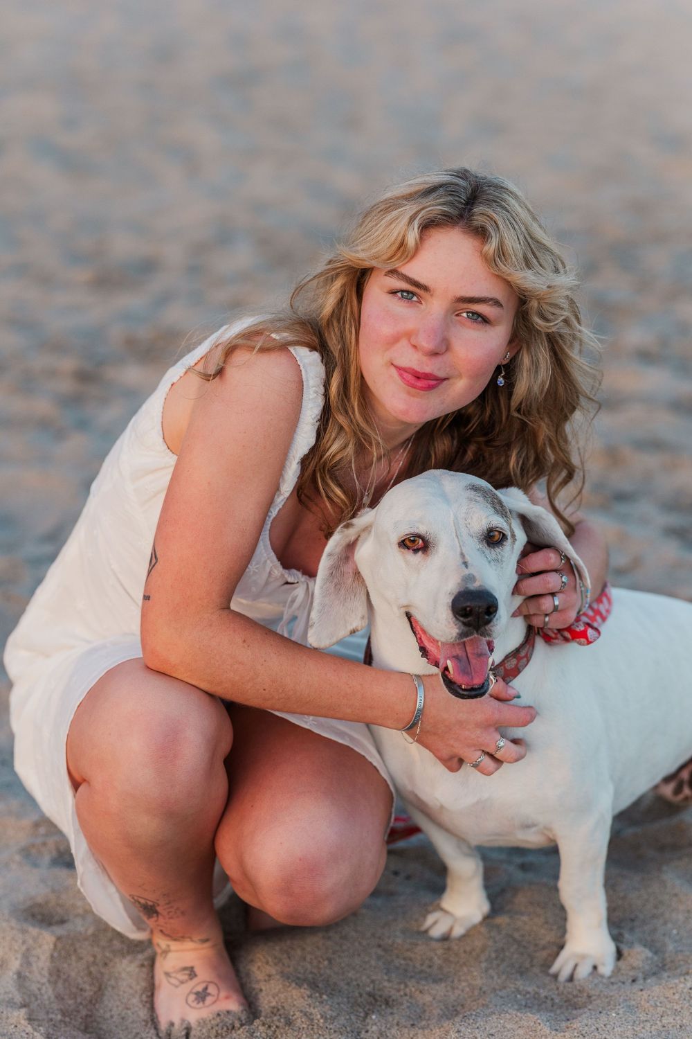 Royal High School graduate posing at Leo Carrillo State Beach in Los Angeles County for stunning outdoor graduation portraits.