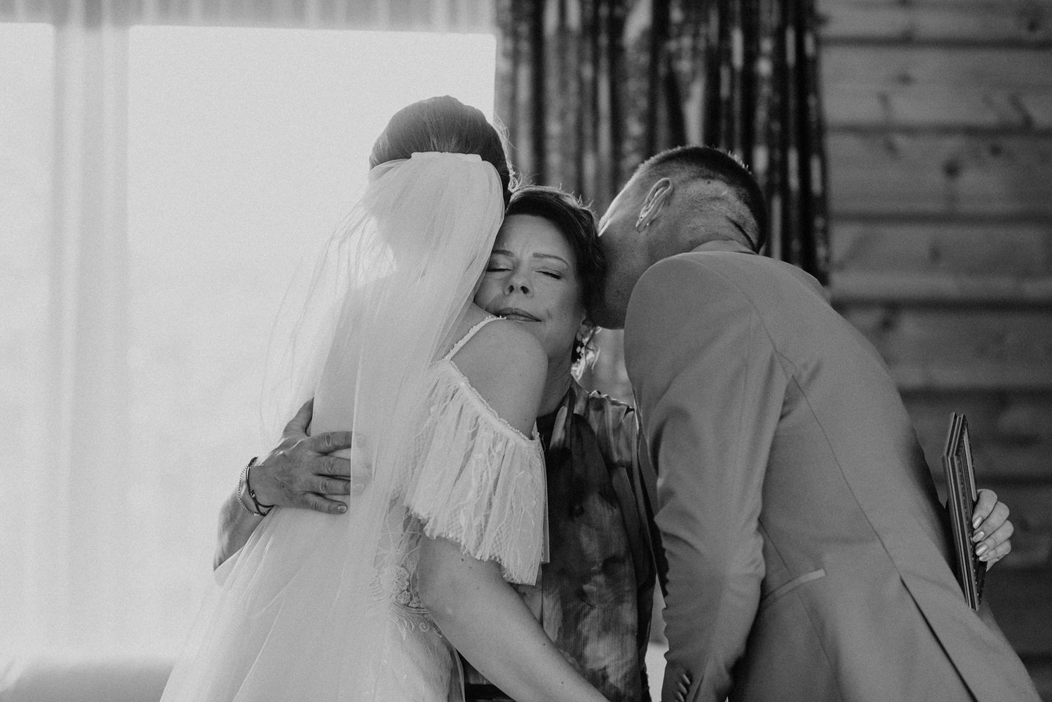 Wedding couple sharing intimate moments during their indoor reception.