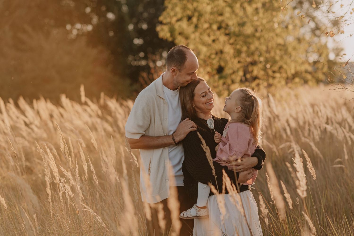 Natural lifestyle family photography session in warm autumn light.