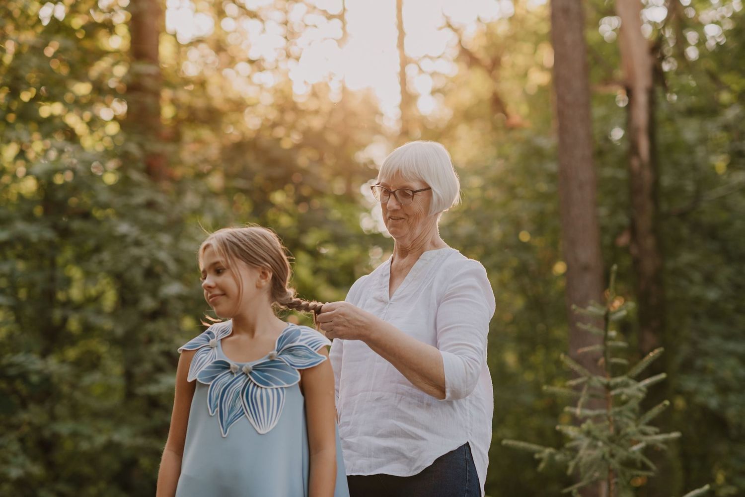 Joyful interactions between loved ones outdoors during a summer evening.