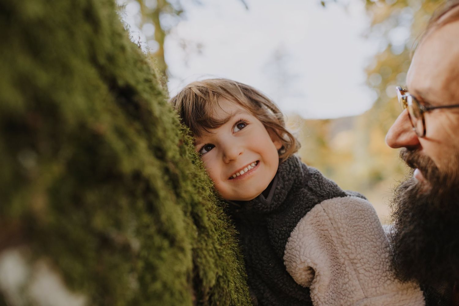 Intimate close-up moments captured during a fall family photoshoot.