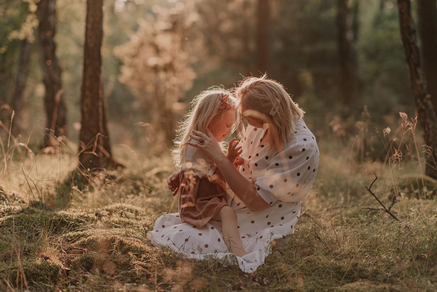 Dreamy sunset photography session in wooded forest setting.