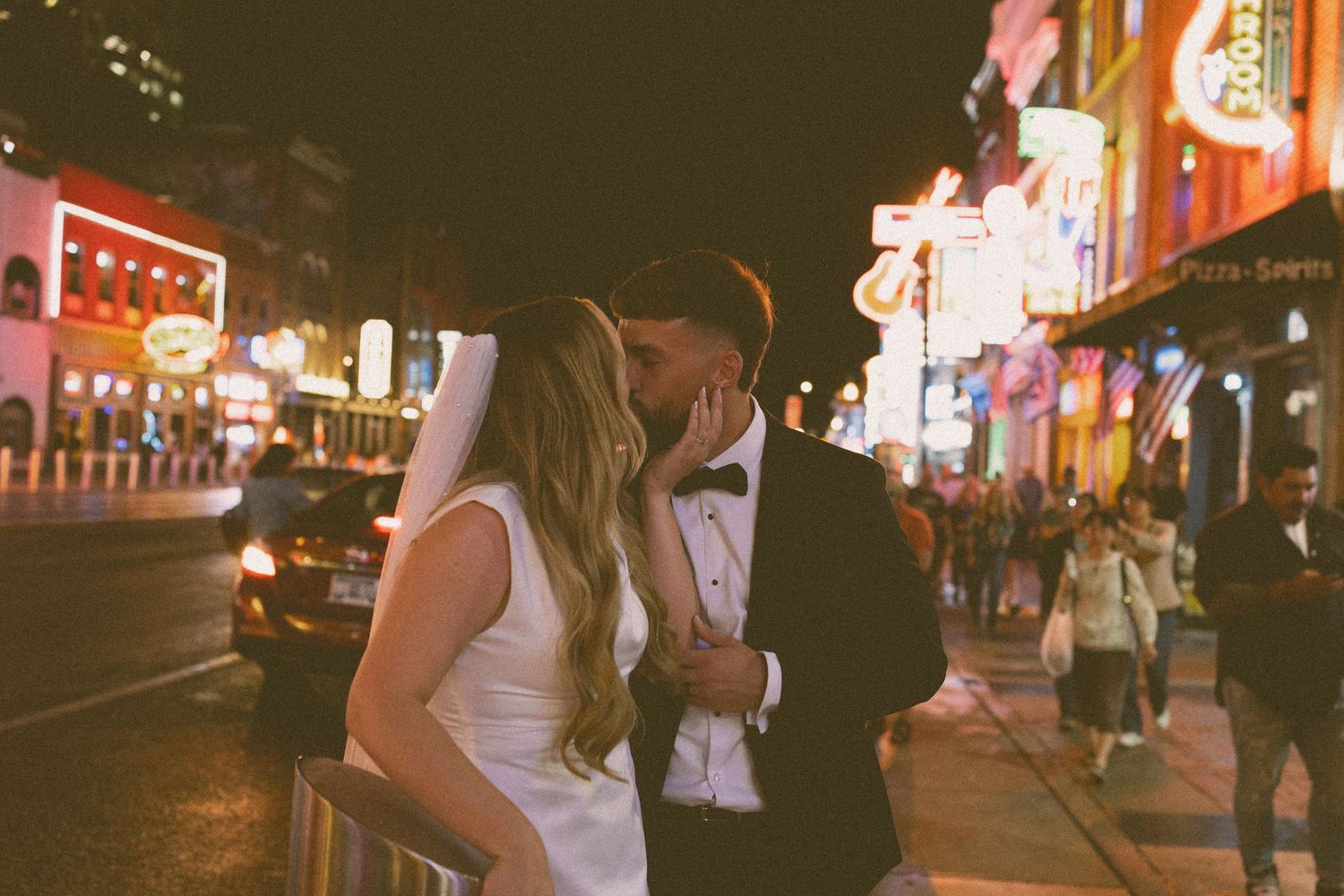 elope Nashville Photographer broadway celebration downtown elopement couple neon lights