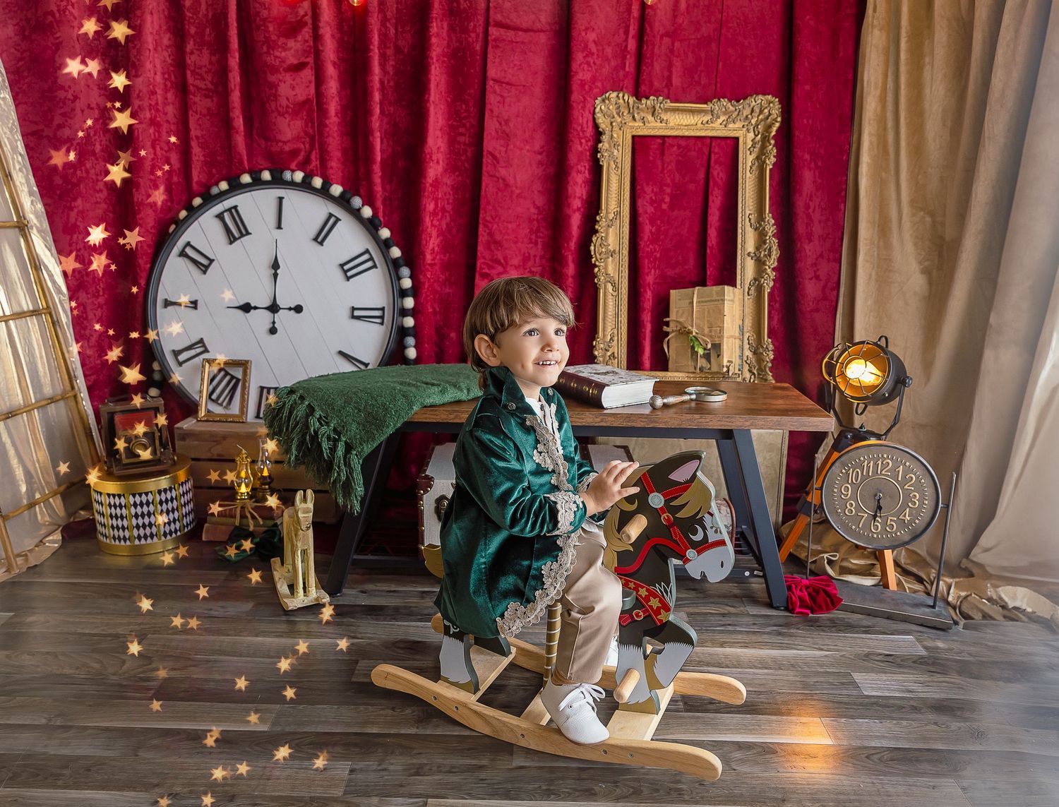 new year little boy riding a wooden vintage horse in a photography scenery