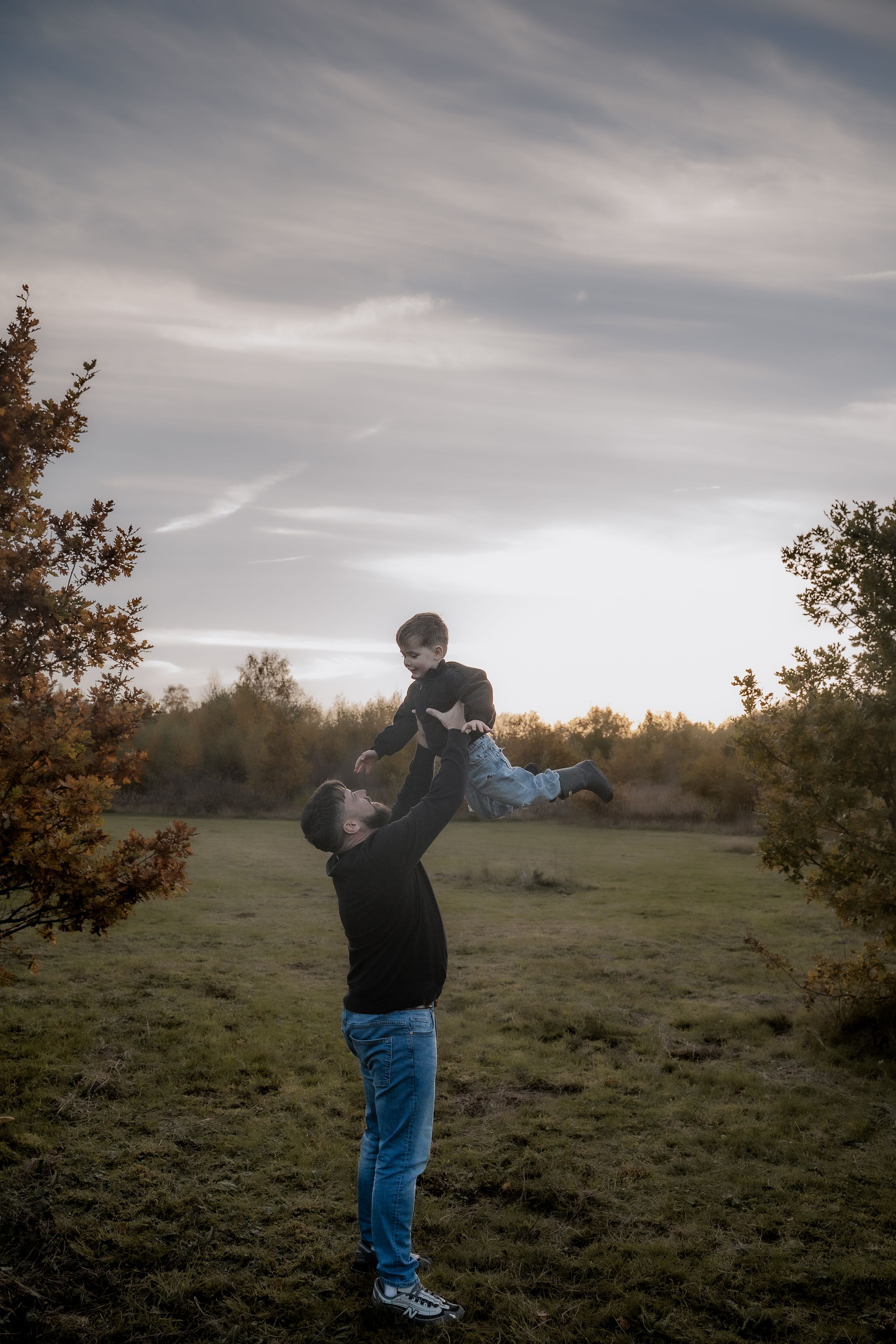 Candid family photography capturing genuine interaction and warmth