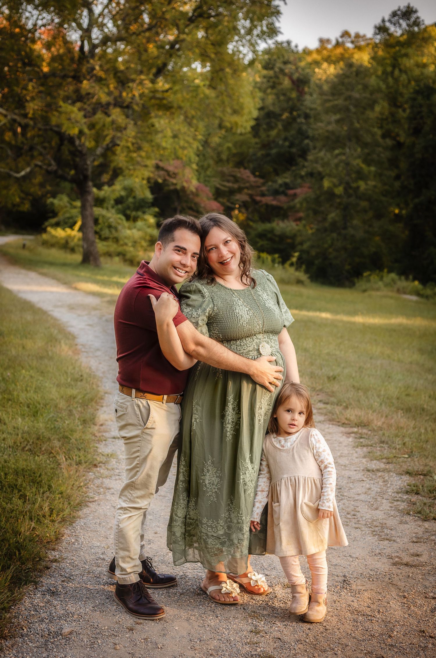Gorgeous family of three with toddler daughter and pregnant mama near Raven's Roost Overlook in September, captured by Somerset Portraits.
