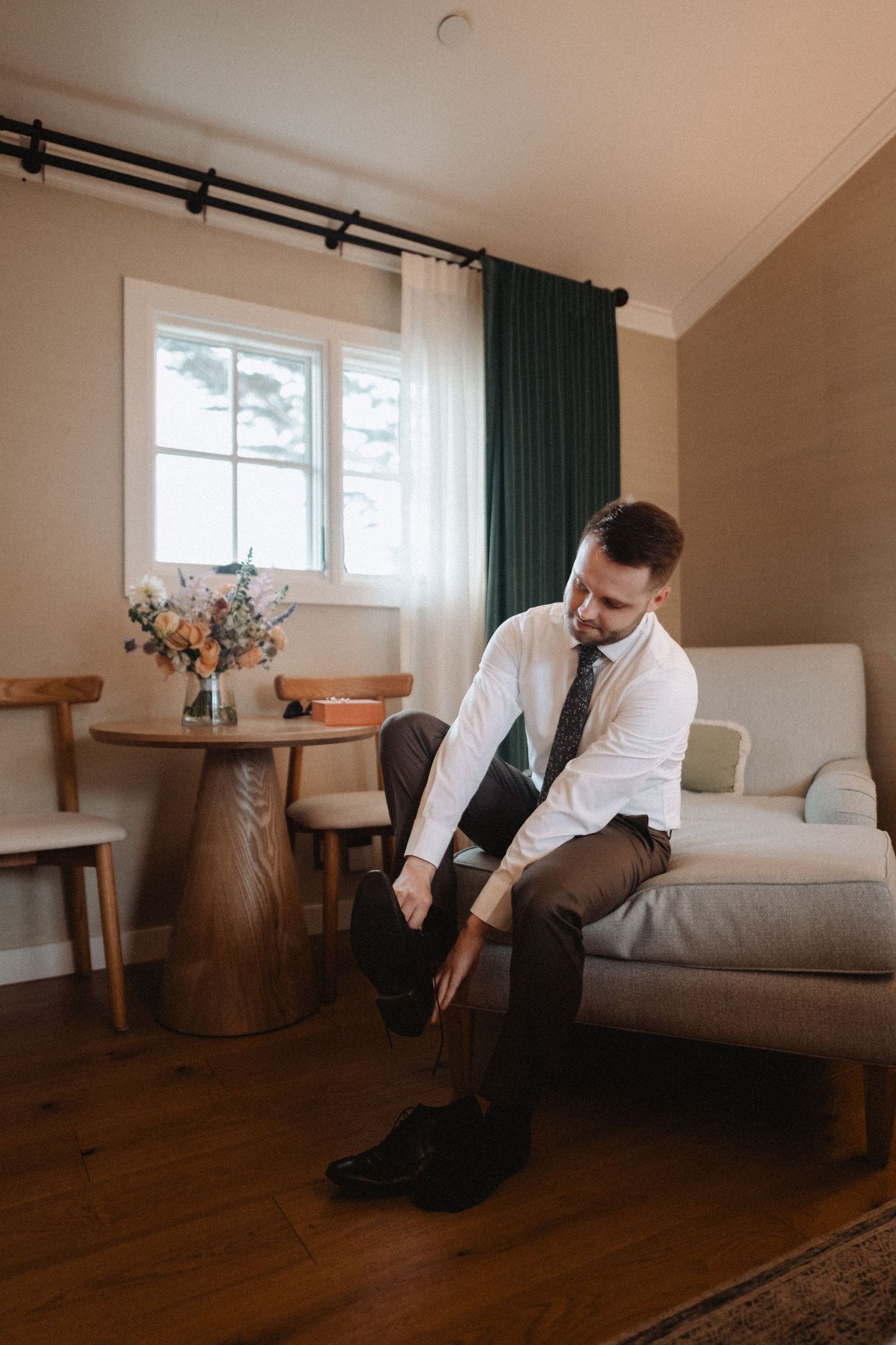 groom getting ready for romantic Big Sur elopement