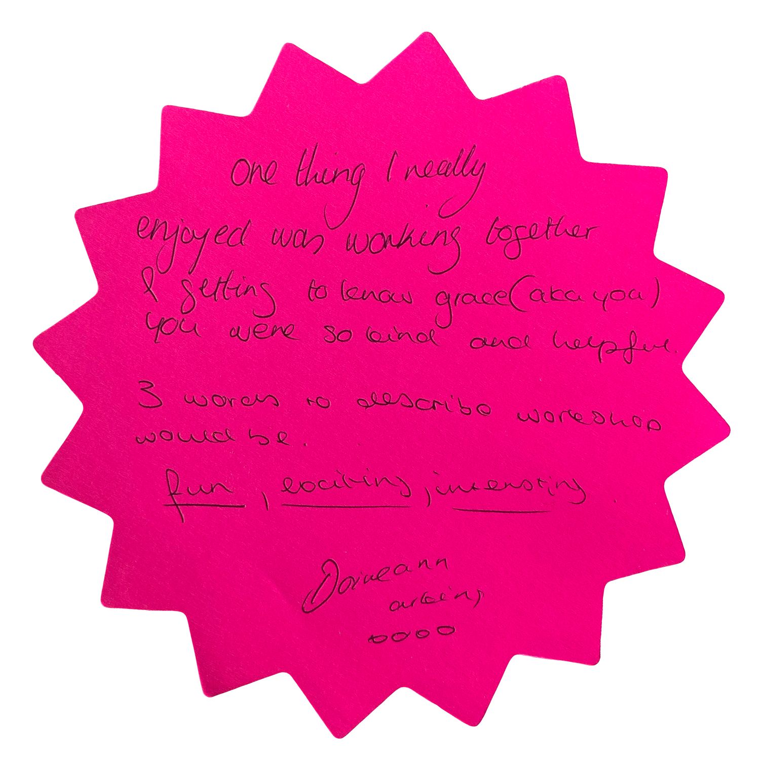 Pink star-shaped paper notes with handwritten text arranged in a row.