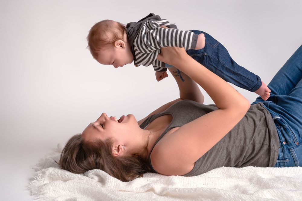 Mother holding her baby in Wolverhampton during family photoshoot