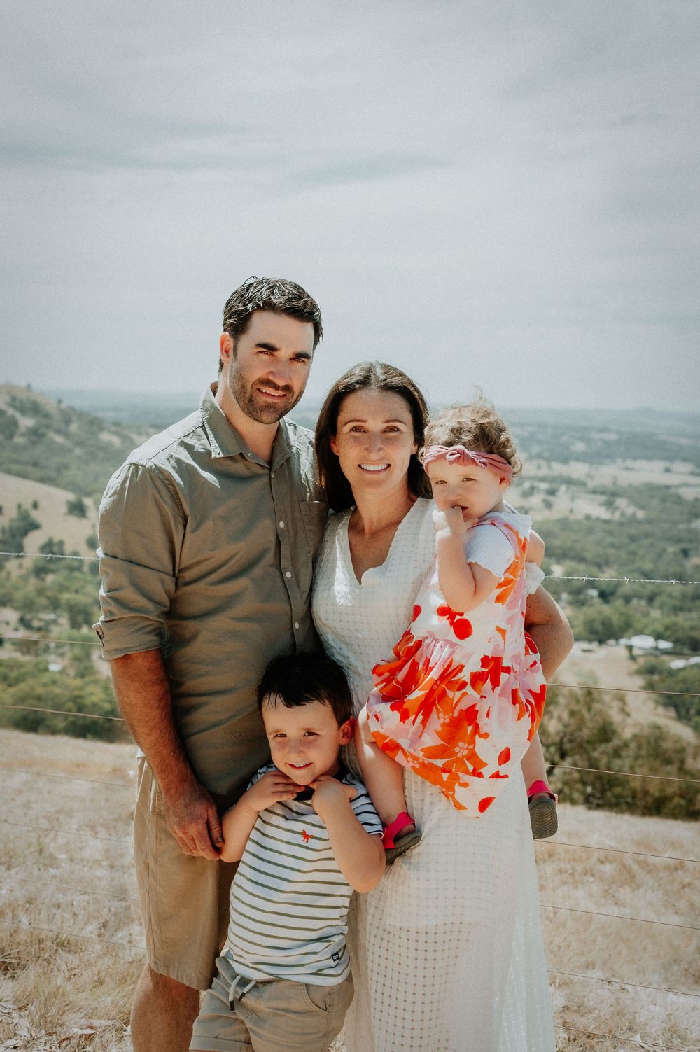 Family portrait session on hilltop with scenic valley backdrop.
Altona Family Photographer Melbourne