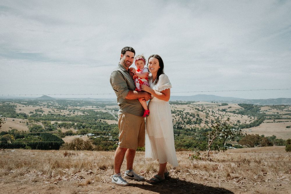 Candid family photos with scenic mountain landscape in background.
Altona Family Photographer Melbourne