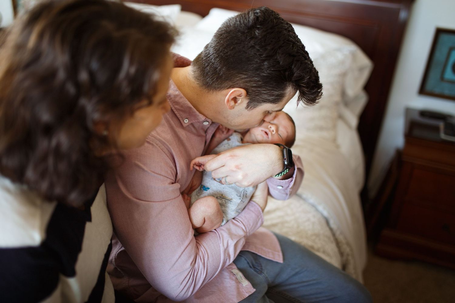 lifestyle newborn photography with a family of three in mukilteo