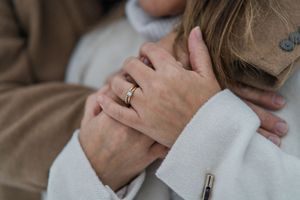 Close up photo showing someone getting a facial massage treatment at a luxury spa.