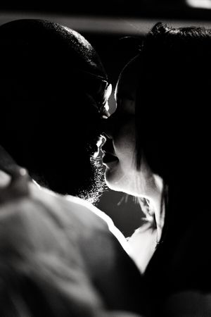 Black and white silhouette profile portraits showing dramatic shadows and lighting effects in a series of connected images.