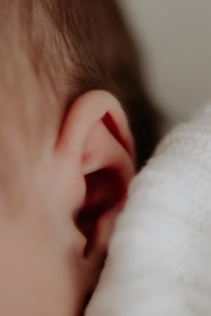 Close up of newborn baby's ear.