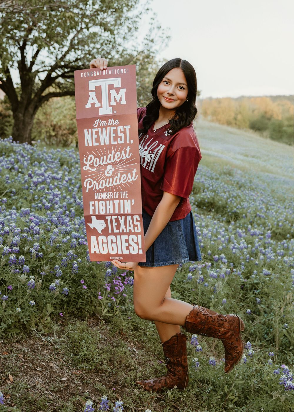 Houston senior photographer capturing modern high school senior portraits with bluebonnets