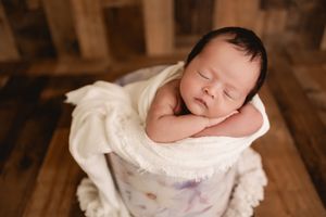 Sweet baby girl prop photos during newborn session