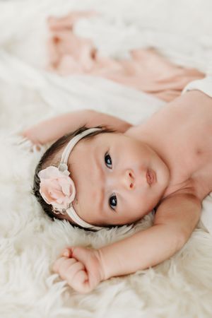 Silly newborn faces during session