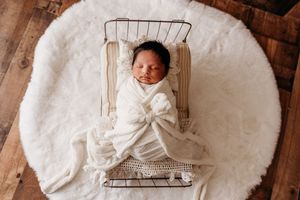 simple bed prop newborn photography