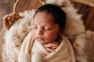 newborn prop natural tones and vibes photography