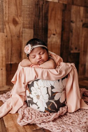 Baby in bucket prop newborn photography