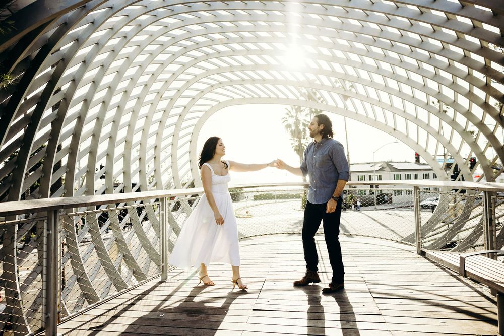 Modern architectural tunnel with geometric patterns and natural lighting creating a striking perspective.