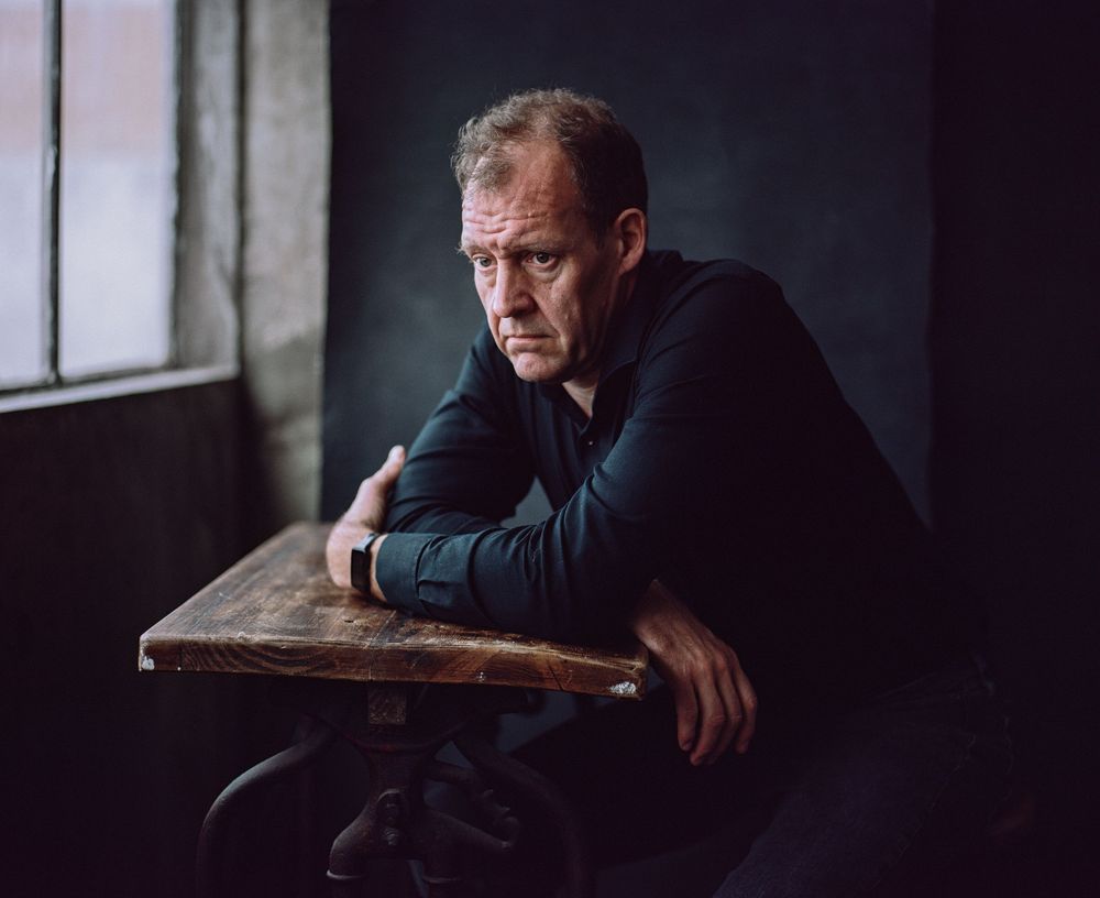 London studio portrait of actor, writer and comedian Justin Edwards