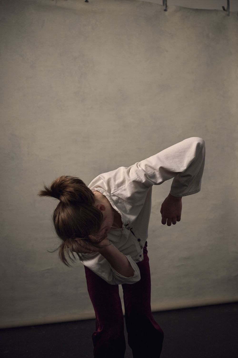 Portrait of contemporary dancer Fernanda Sumray in motion shot in the London studio