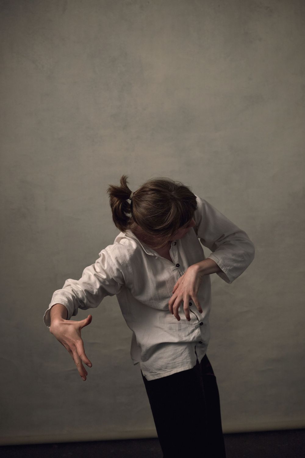Portrait of contemporary dancer Fernanda Sumray in motion shot in the London studio