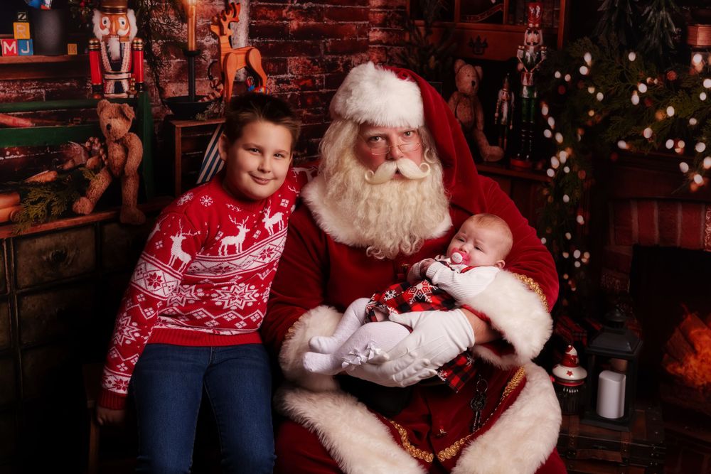 A festive Christmas photo with holiday sweaters and seasonal decorations.