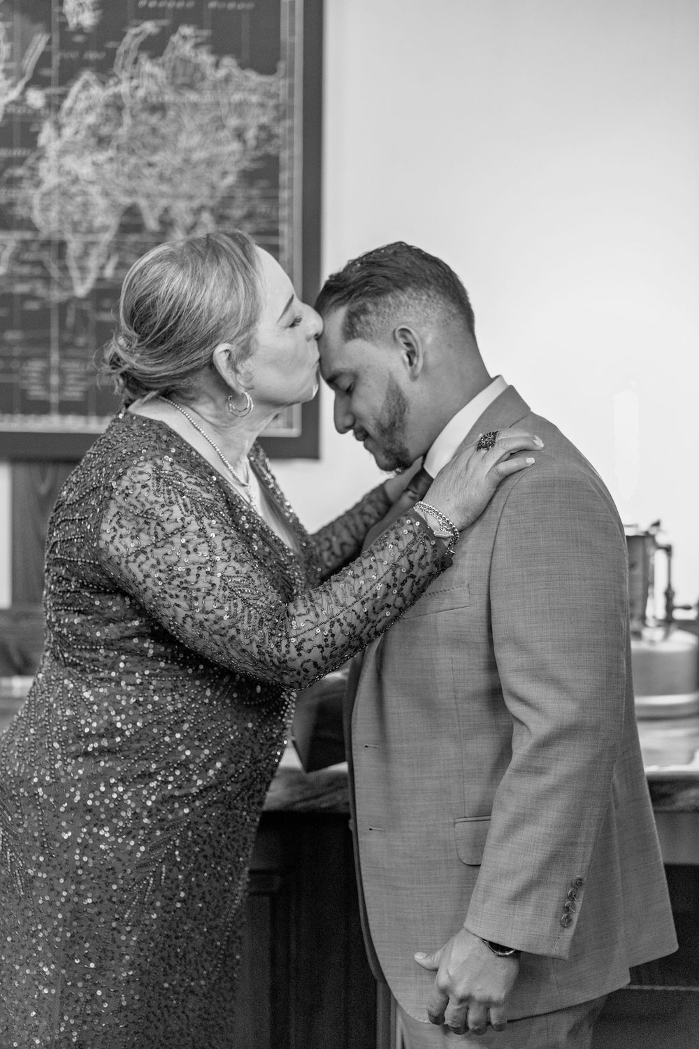 A touching emotional moment shared between family members during a wedding celebration.