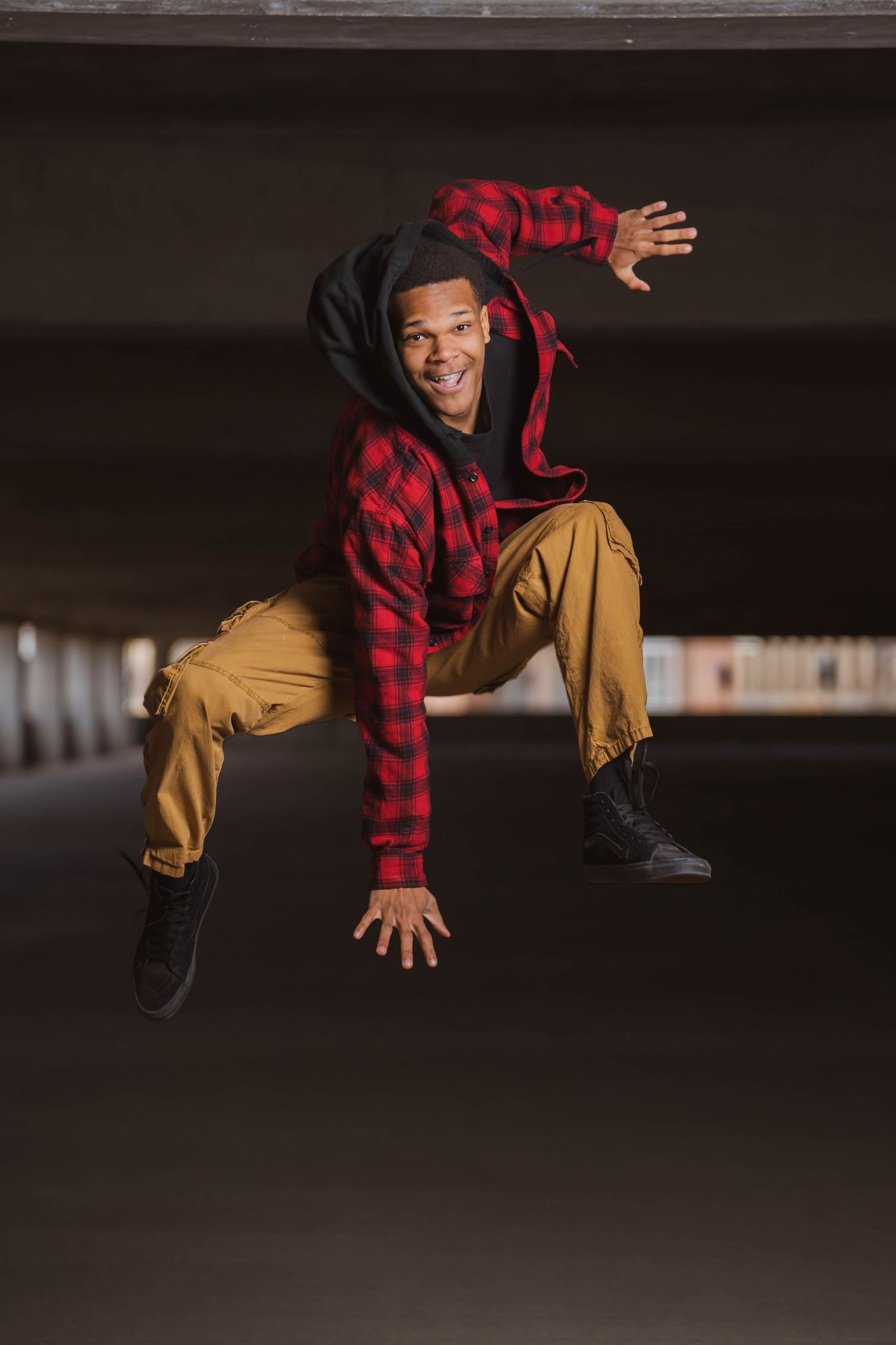A person poses for a solo portrait, showcasing confidence and personality