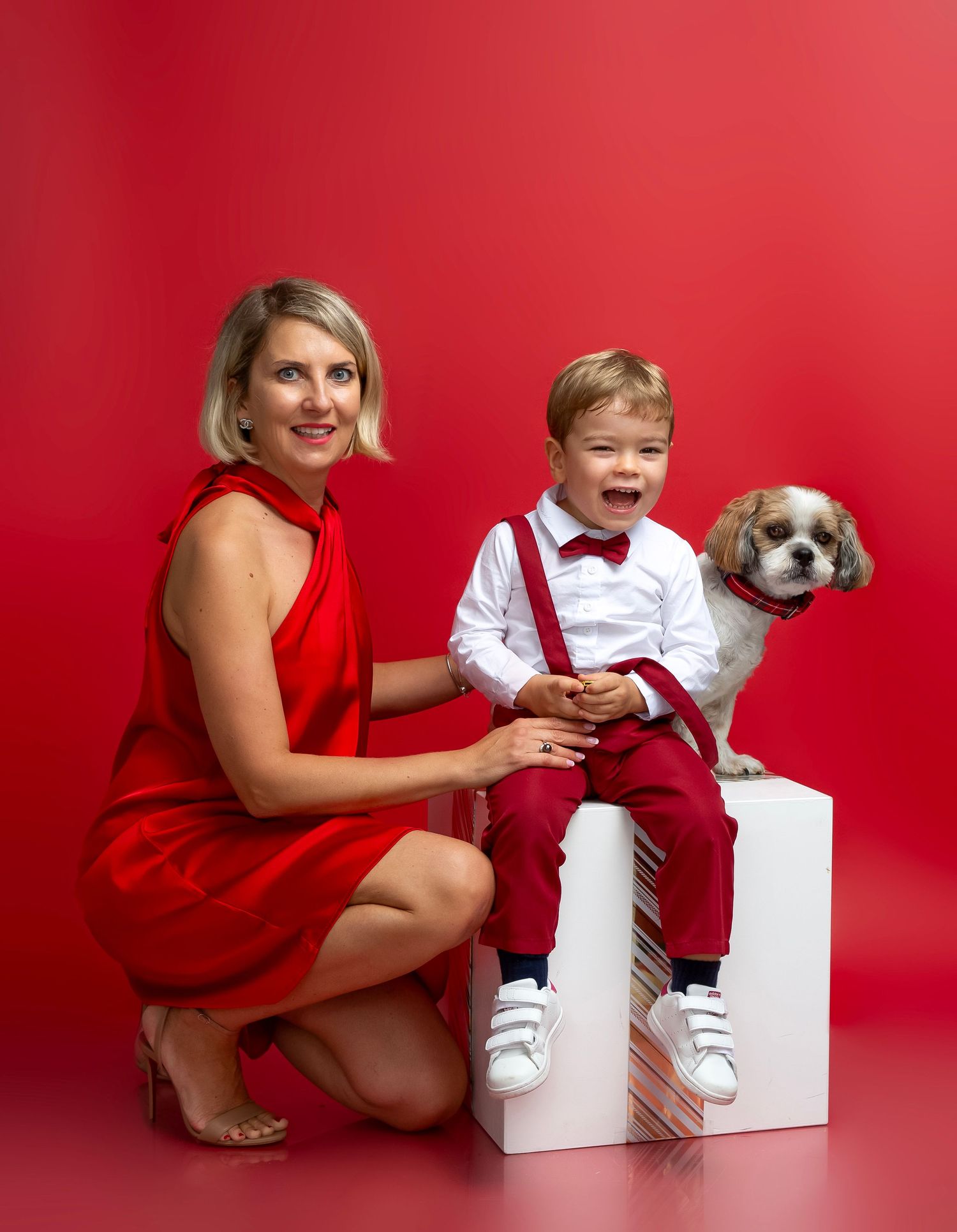 Magical Christmas studio portrait with holiday decor — captured in Bradenton-Sarasota Lakewood Ranch by local portrait photographer