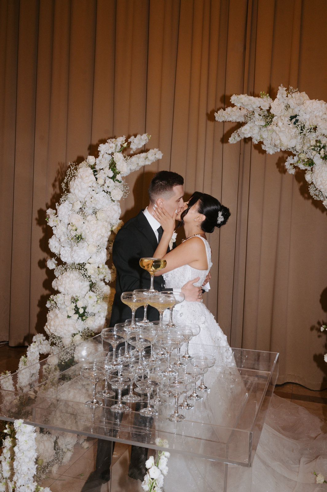 wedding-champagne-tower-at-budapest-reception-romantic-toast-moment-with-glass-pyramid-and-bubbles.jpg