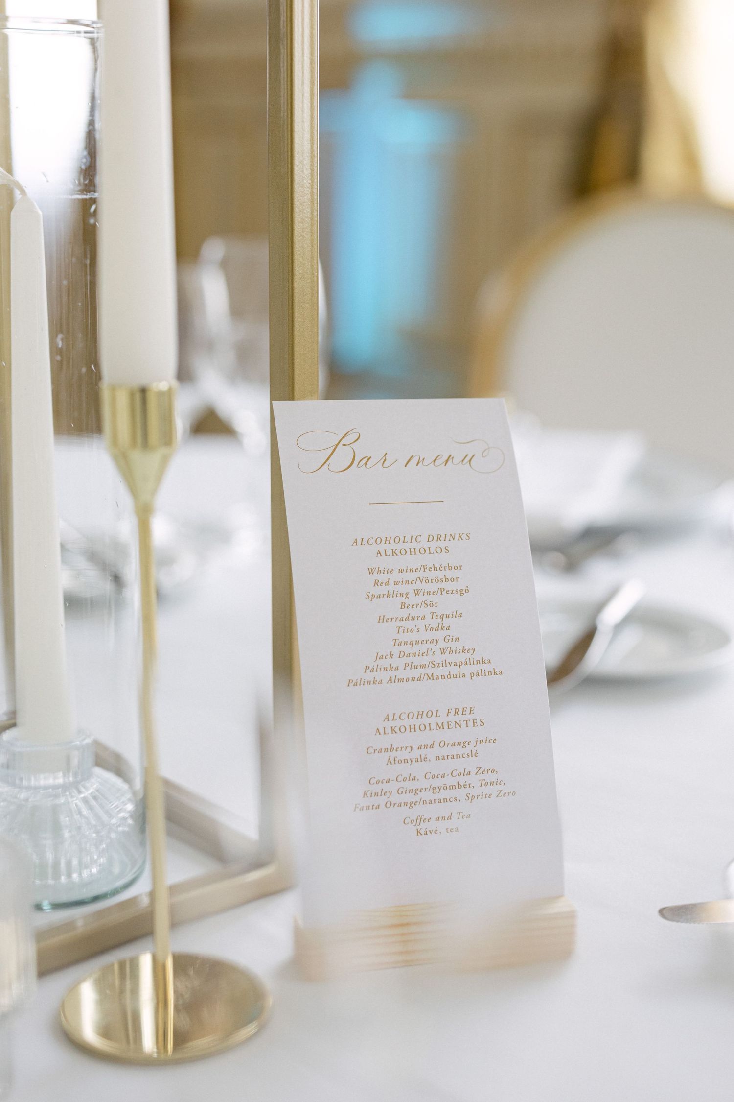 luxury-wedding-reception-decor-in-grand-ballroom-at-corinthia-budapest-with-floral-centerpieces-and-golden-details.jpg
