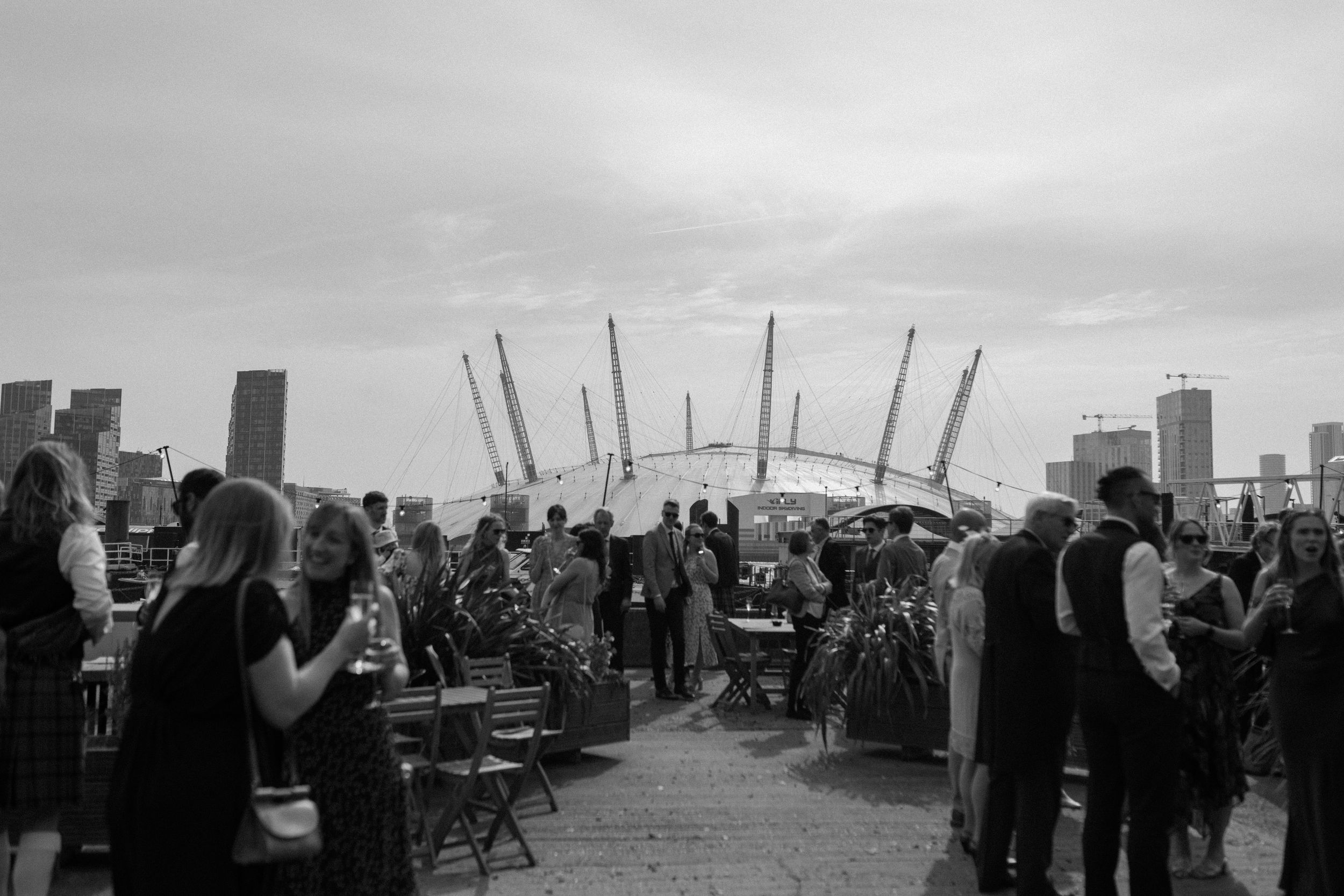 Guests gather at a Trinity Buoy Wharf wedding in London.
