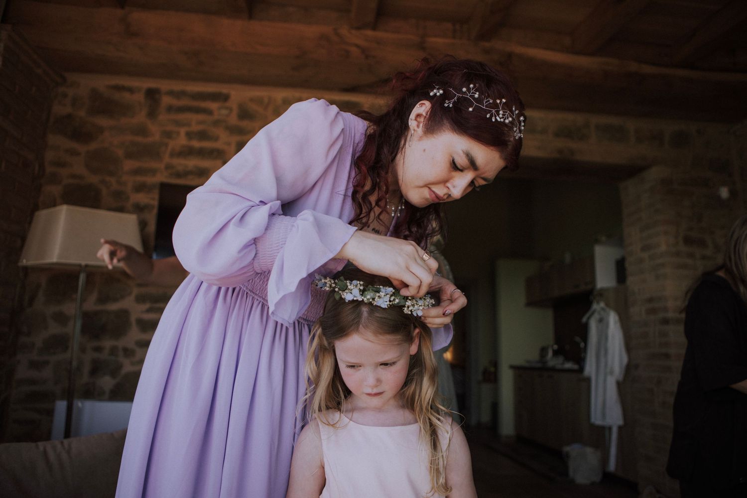 Daughter during wedding preparation at Perugia Vecchia Relais photographed by Gianluca e Arianna in Umbria, Italy.