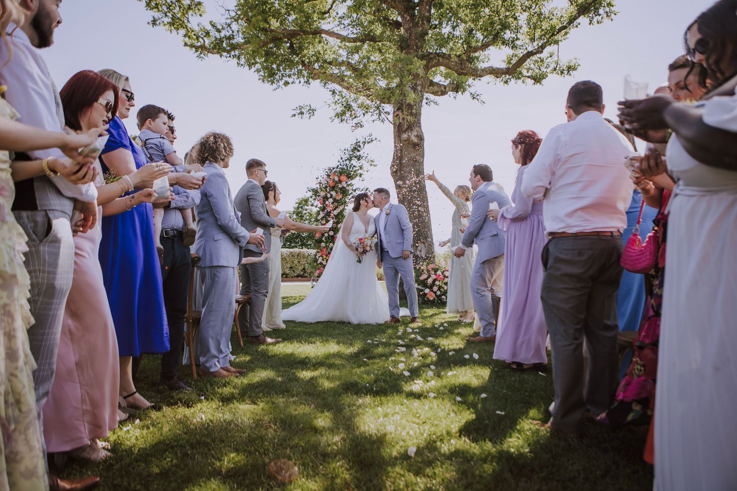 Abbieann and Paul kissing at their wedding at Perugia Vecchia Relais photographed by Gianluca e Arianna.
