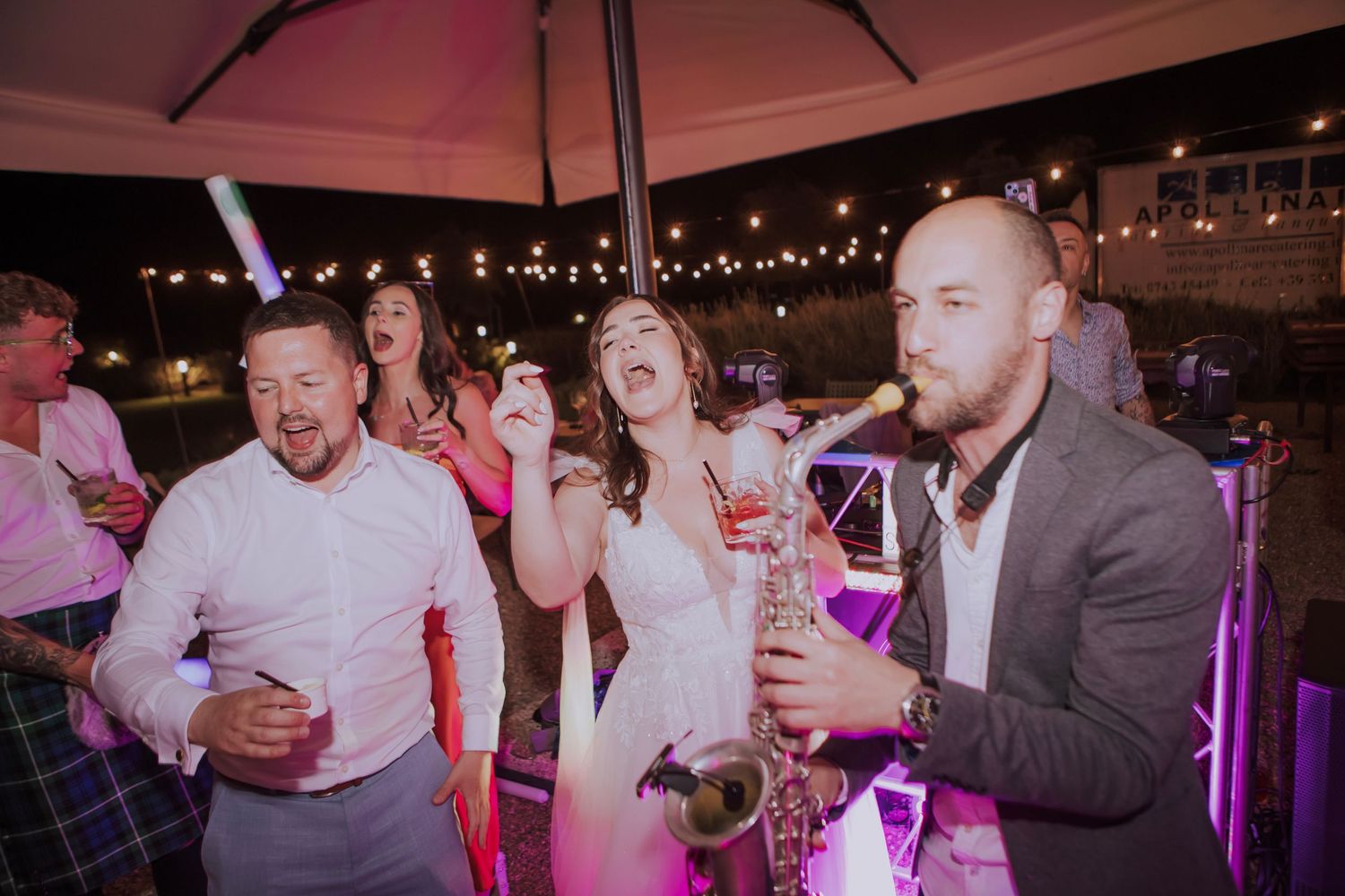 newlyweds dancing at their wedding party in Umbria