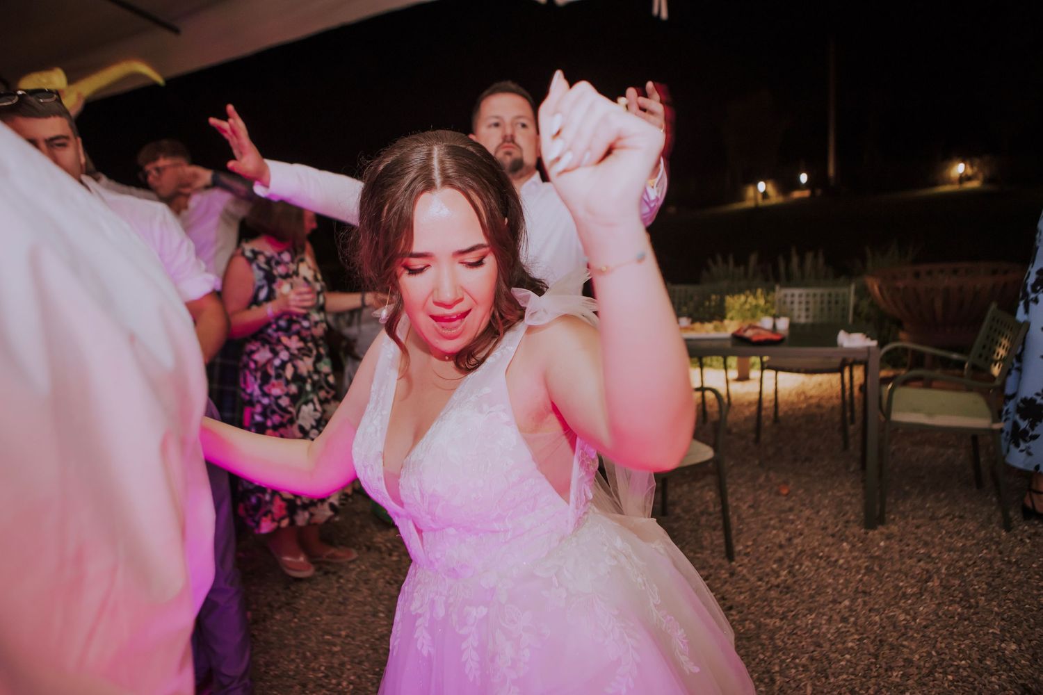 Bride dancing at her wedding party at Perugia Vecchia Relais photographed by Gianluca e Arianna Wedding Photographers in Umbria, Italy.