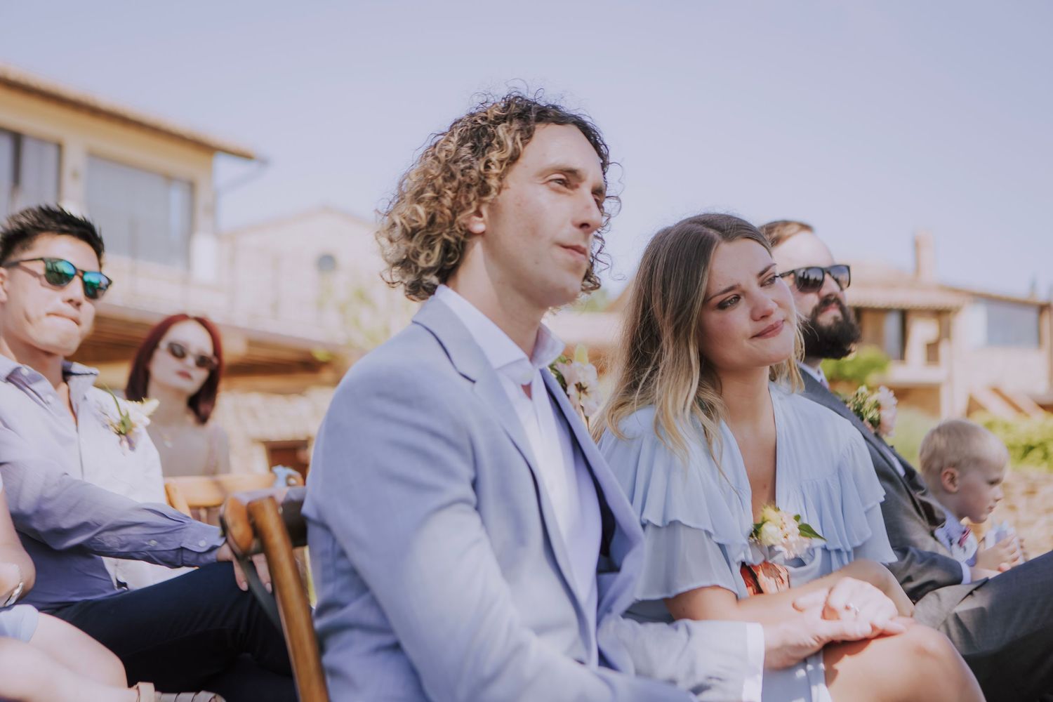 Guests getting emotional during friends' ceremony at Perugia Vecchia Relais photographed by Gianluca e Arianna Wedding Photographers.