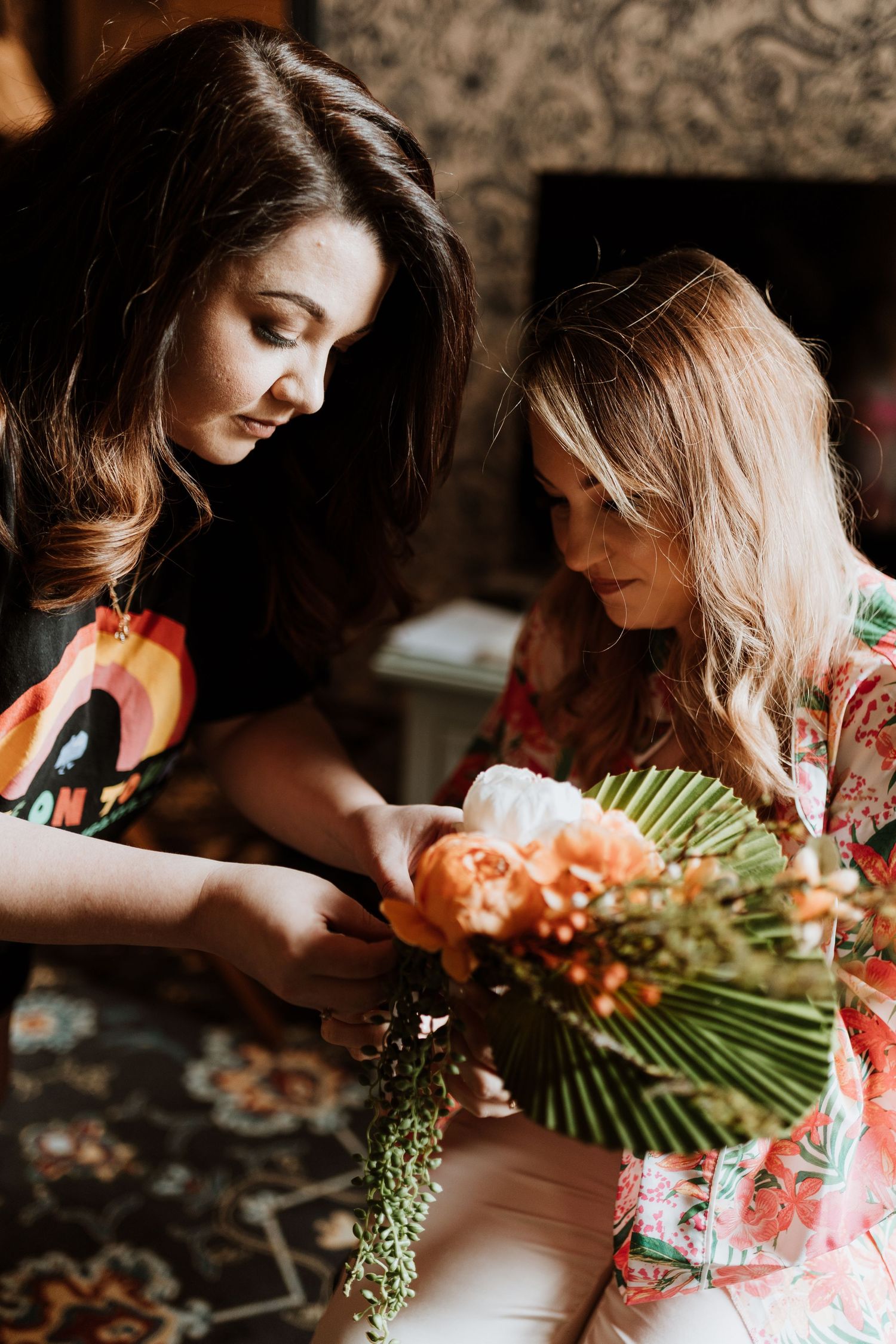 Bride and her best friend getting ready