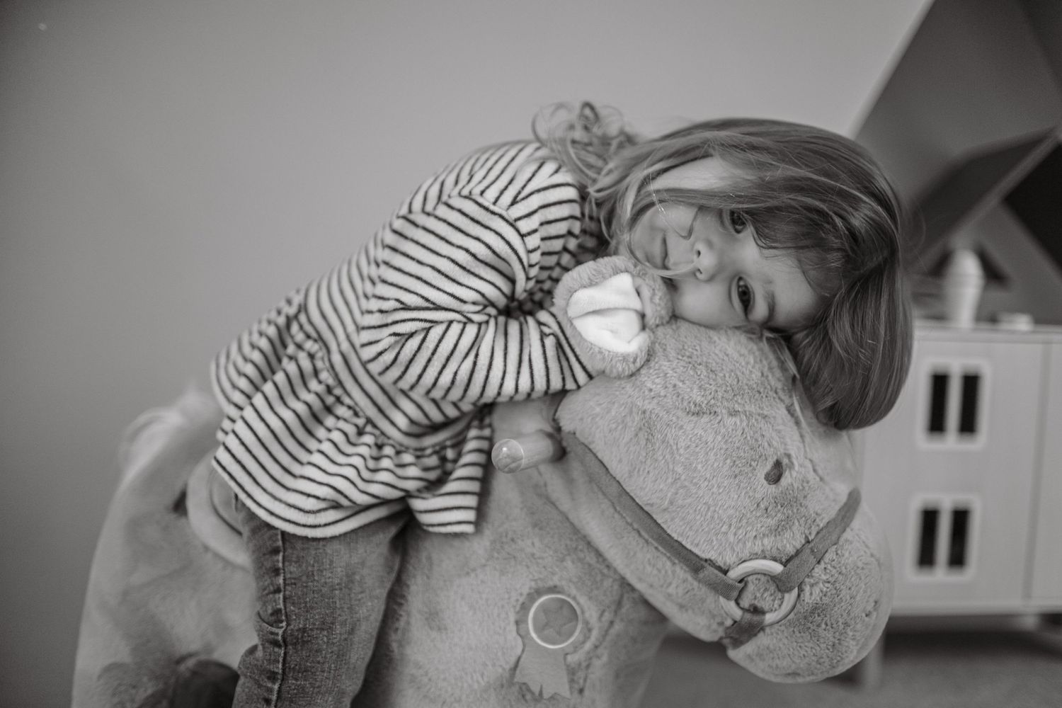 Black and white photo series showing wedding preparations with bride and bridesmaids getting ready.