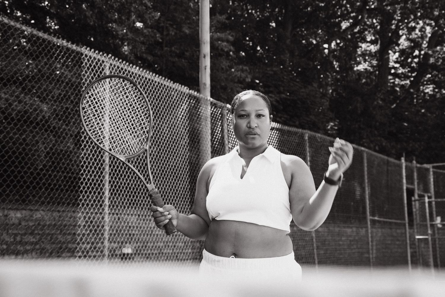 A sequence of tennis serve action shots showing the progression of an overhead service motion on an outdoor court.