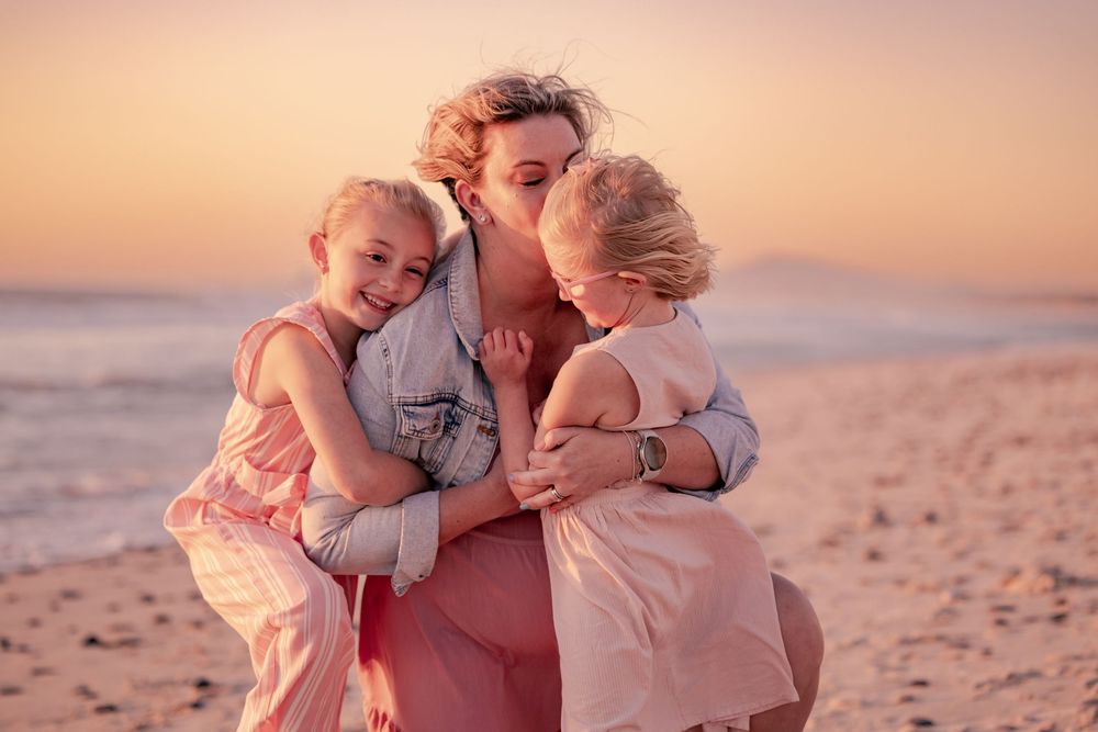 Beautiful sunset maternity photoshoot Cape Town of family on Blouberg beach By Grace Photography Birth photographer