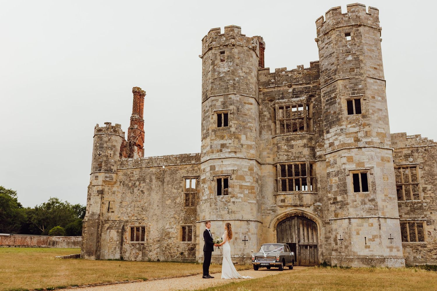 Bride and groom with historic Titchfield Abbey as the backdrop.