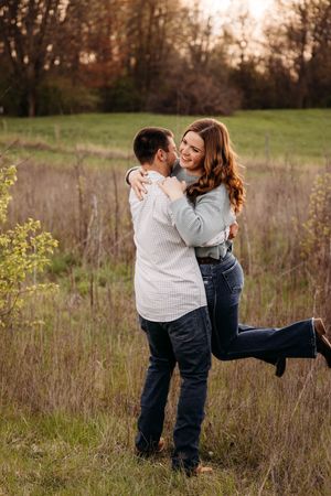 Engagement Photo shoot during golden hour in a scenic reserve.