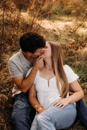Engagement Photo shoot during golden hour in a scenic reserve.